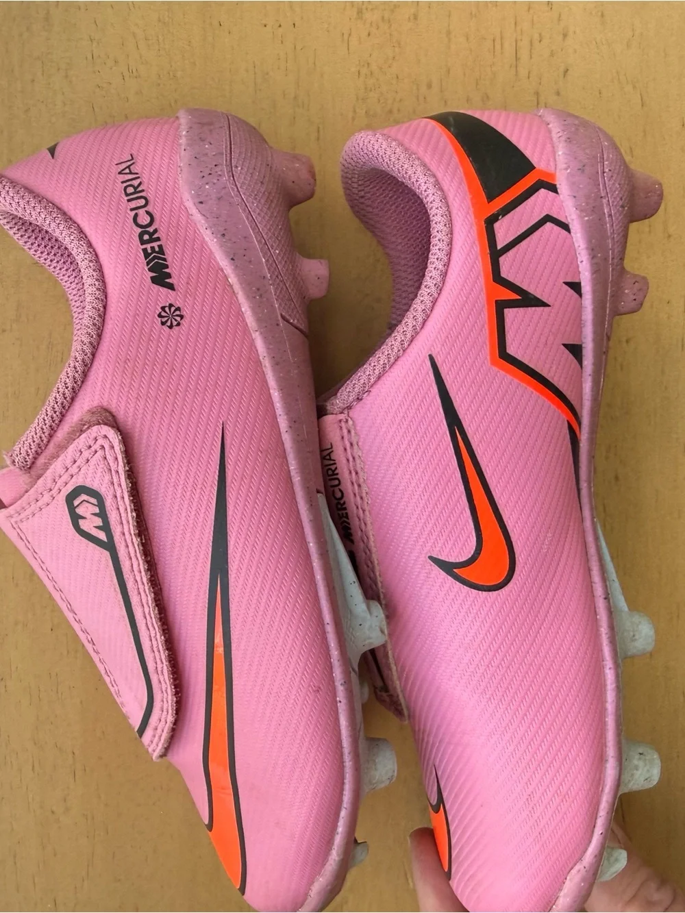 Nike Mercurial Kids Pink Soccer Cleats with Orange and Black Accents